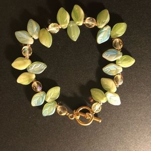 Green iridescent leaves make an adorable bracelet.